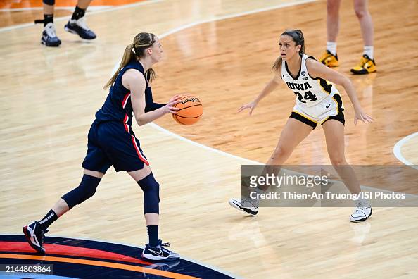 Gabbie Marshall of the Iowa Hawkeyes guard Paige Bueckers of the ...