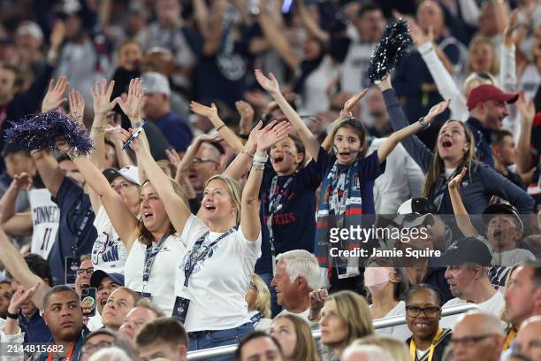 Connecticut Huskies fans cheer during the NCAA Men's Basketball Tournament Final Four semifinal game between the Alabama Crimson Tide and the...