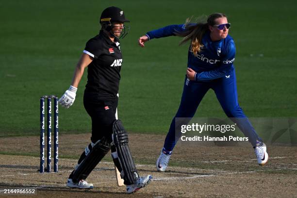 Sophie Ecclestone of England bowls during game three of the Women's ODI series between New Zealand and England at Seddon Park on April 07, 2024 in...