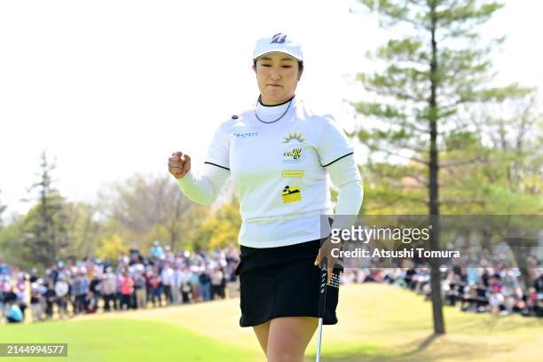 Miyuu Abe of Japan celebrates winning the tournament on the 18th green during the final round of Fujifilm Studio Alice Ladies Open at Ishizaka Golf...