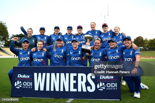 England celebrate winning the series after losing game three of the Women's ODI series between New Zealand and England at Seddon Park on April 07,...