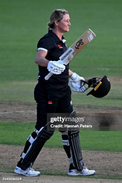 Sophie Devine of New Zealand celebrates her century and winning game three of the Women's ODI series between New Zealand and England at Seddon Park...