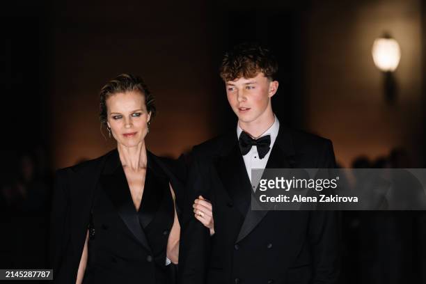 Eva Herzigova with son George are seen at the Dolce&Gabbana 40th Anniversary party at on April 06, 2024 in Milan, Italy.