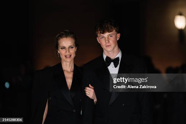 Eva Herzigova with son George are seen at the Dolce&Gabbana 40th Anniversary party at on April 06, 2024 in Milan, Italy.