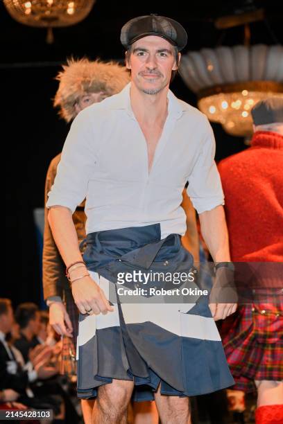 Model walks the runway at the Dressed To Kilt 2024 fashion show at Exhibition Place on April 06, 2024 in Toronto, Ontario.