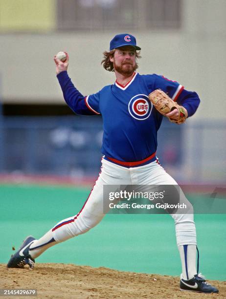 Pitcher Rick Sutcliffe of the Chicago Cubs pitches against the Pittsburgh Pirates during a game at Three Rivers Stadium in 1988 in Pittsburgh,...