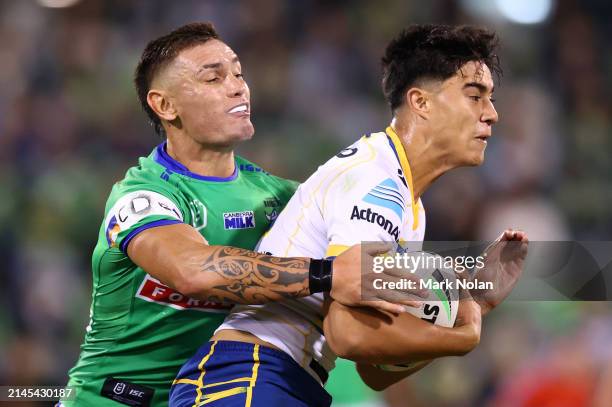 Blaize Talagi of the Eels is tackled during the round five NRL match between Canberra Raiders and Parramatta Eels at GIO Stadium, on April 07 in...
