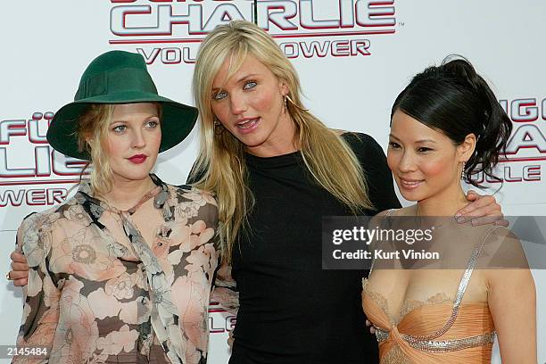 Actresses Drew Barrymore, Cameron Diaz and Lucy Liu arrive at the Berlin premiere of "Charlie's Angels 2: Full Throttle" July 8, 2003 in Berlin,...