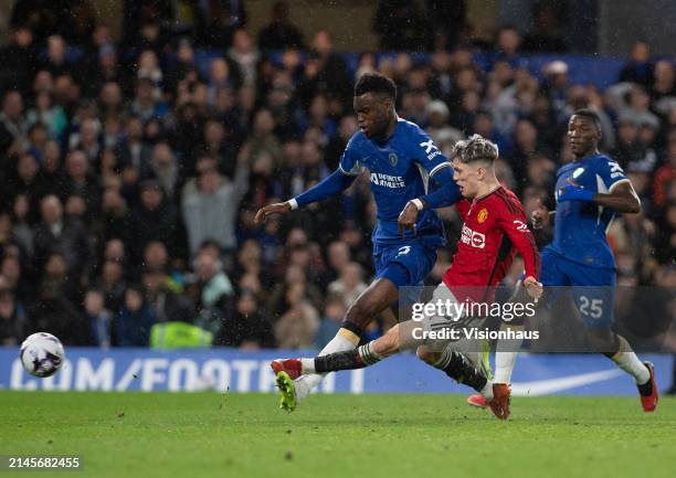 Alejandro Garnacho of Manchester United beats Benoit Badiashile of Chelsea to score Utd's first goal during the Premier League match between Chelsea...