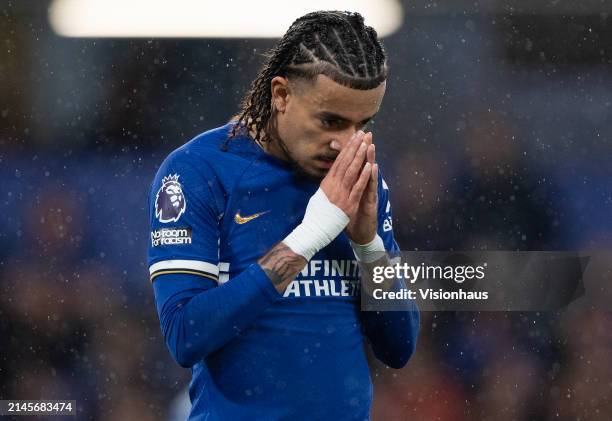 Malo Gusto of Chelsea reacts after Manchester United's second goal during the Premier League match between Chelsea FC and Manchester United at...