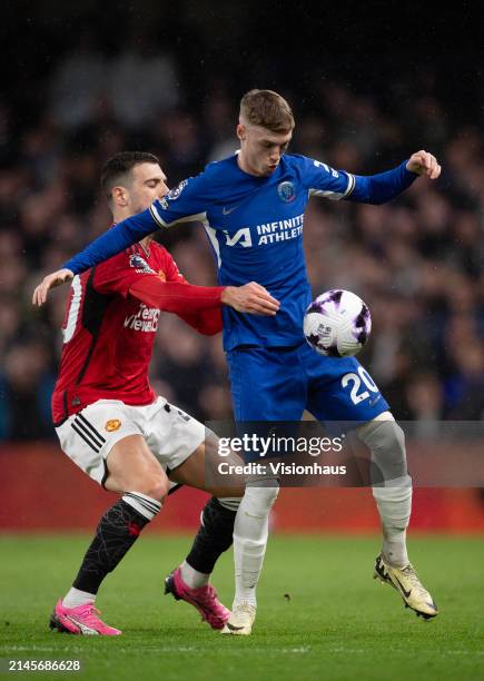 Diogo Dalot of Manchester United and Cole Palmer of Chelsea during the Premier League match between Chelsea FC and Manchester United at Stamford...