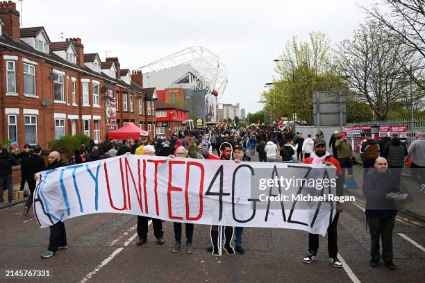 Detailed view of a banner reading 'A City United 4 Gaza' outside the stadium prior to the Premier League match between Manchester United and...