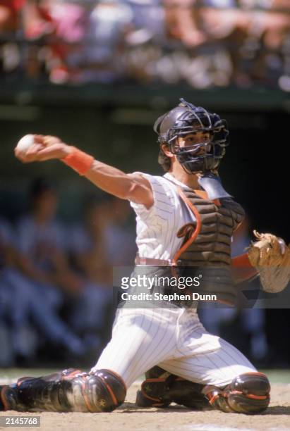Benito Santiago of the San Diego Padres throws the ball during the 1989 season.