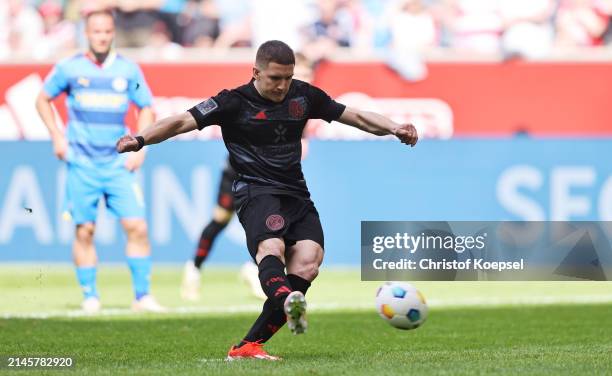 Christos Tzolis of Düsseldorf scores the second goal by penalty during the Second Bundesliga match between Fortuna Düsseldorf and Eintracht...