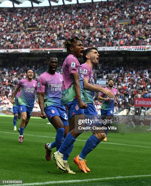 Christian Pulisic of AC Milan celebrates with team-mates after scoring the opening goal during the Serie A TIM match between AC Milan and US Lecce -...