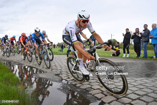 Mathieu van der Poel of The Netherlands and Team Alpecin - Deceuninck competes passing through the Hornaing à Wandignies cobblestones sector during...