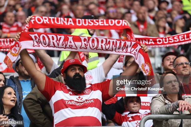 Fans of Düsseldorf react during the Second Bundesliga match between Fortuna Düsseldorf and Eintracht Braunschweig at Merkur Spiel-Arena on April 07,...