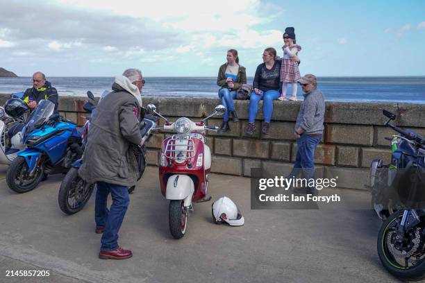 Man parks his scooter on Scarborough seafront after completing a memorial bike ride for Dave Myers of the Hairy Bikers on April 07, 2024 in...