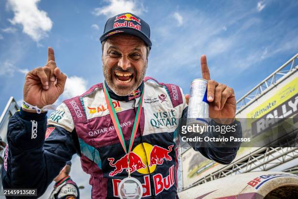 Nasser Al Attiyah of Qatar celebrate at the award ceremony awards for the FIA Rally Raid Portugal 2024 event of the World Rally-Raid Championship on...