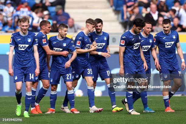 Andrej Kramaric of TSG 1899 Hoffenheim celebrates with teammates after scoring his team's second goal during the Bundesliga match between TSG...