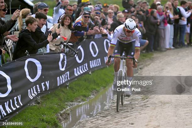 Mathieu van der Poel of The Netherlands and Team Alpecin - Deceuninck competes in the breakaway passing through the Pont-Thibault à Ennevelin...