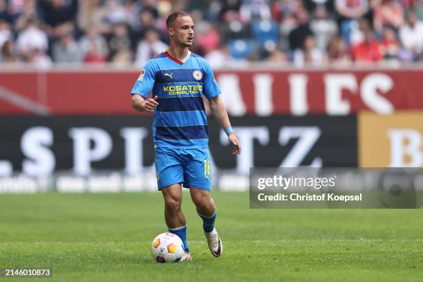 Marvin Rittmueller of Braunschweig runs with the ball during the Second Bundesliga match between Fortuna Düsseldorf and Eintracht Braunschweig at...