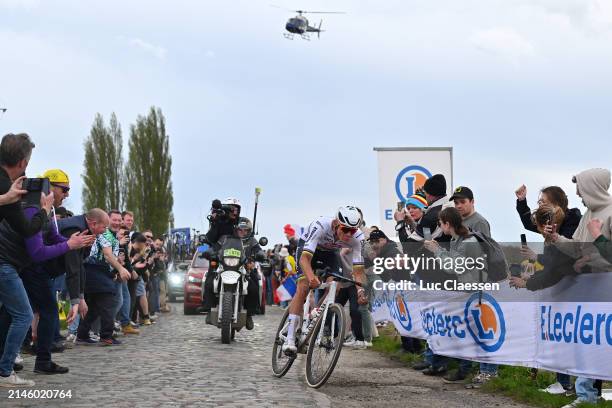 Mathieu van der Poel of The Netherlands and Team Alpecin - Deceuninck competes in the breakaway passing through the Carrefour de l'Arbre cobblestones...