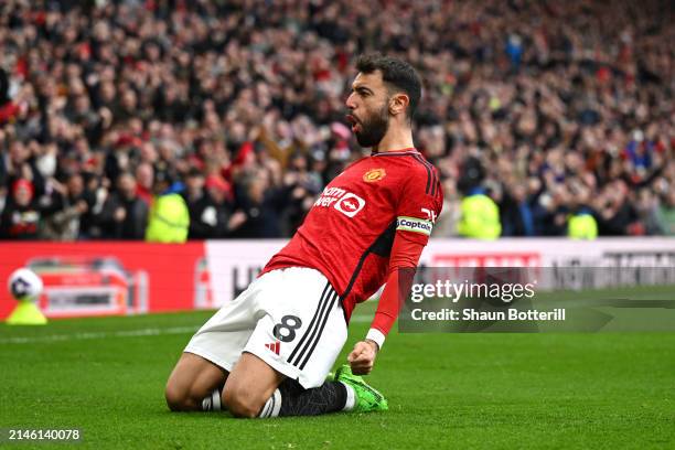 Bruno Fernandes of Manchester United celebrates scoring his team's first goal during the Premier League match between Manchester United and Liverpool...