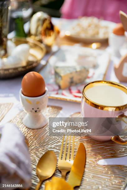 stylish easter brunch table setting - easter breakfast stock pictures, royalty-free photos & images