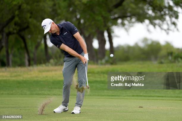 Alex Noren of Sweden plays his third shot on the 1st hole during the final round of the Valero Texas Open at TPC San Antonio on April 07, 2024 in San...