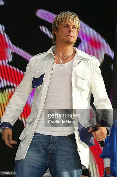 Duncan from Blue performs on stage at the Capital FM Princes Trust "Party in the Park" July 7, 2003 at Hyde Park in London.