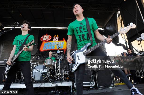 Justin Sane and Chris Barker of Anti-Flag performs during the Vans Warped tour at Pier 30/32 on June 27, 2009 in San Francisco, California.