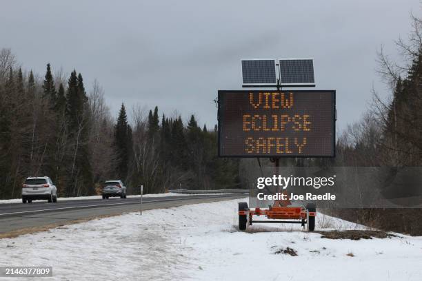 Sign placed along I-95 encourages people to view the upcoming eclipse safely on April 07, 2024 in Houlton, Maine. Millions of people have flocked to...