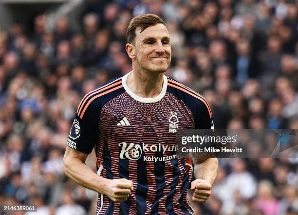 Chris Wood of Nottingham Forest celebrates scoring his team's first goal during the Premier League match between Tottenham Hotspur and Nottingham...