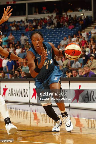Chamique Holdsclaw of the Washington Mystics drives to the basket during the game against the Sacramento Monarchs on July 2, 2003 at Arco Arena in...