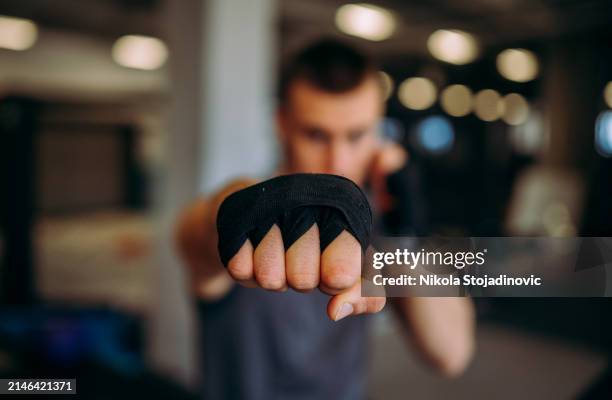 serious male fighter ready for training - determination face stock pictures, royalty-free photos & images