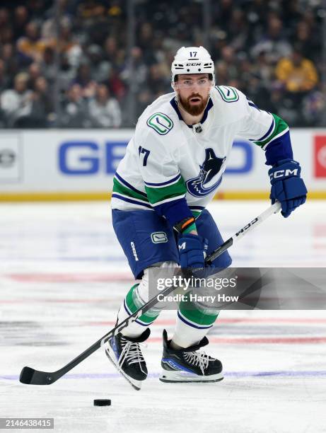 Filip Hronek of the Vancouver Canucks controls the puck at the point during a 6-3 Los Angeles Kings win at Crypto.com Arena on April 06, 2024 in Los...