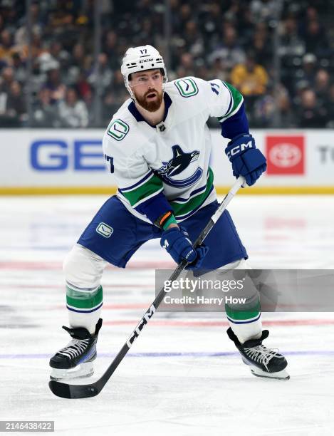 Filip Hronek of the Vancouver Canucks controls the puck at the point during a 6-3 Los Angeles Kings win at Crypto.com Arena on April 06, 2024 in Los...