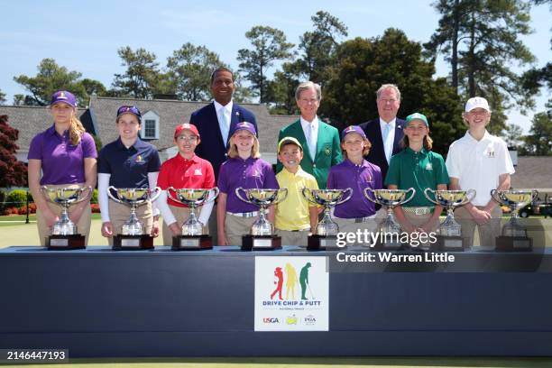 The champions pose with USGA President Fred Perpall, Chairman of Augusta National Golf Club Fred Ridley and PGA of America President John Lindert...