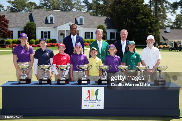 The champions pose with USGA President Fred Perpall, Chairman of Augusta National Golf Club Fred Ridley and PGA of America President John Lindert...