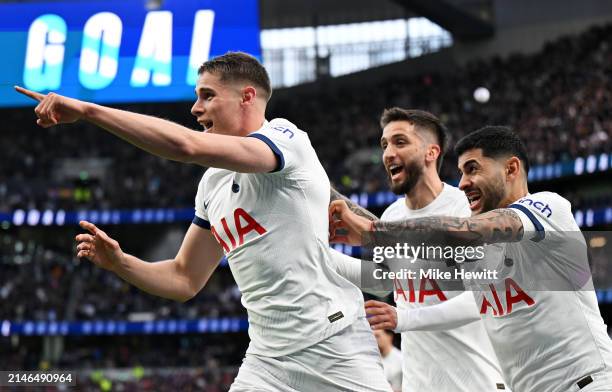 Micky van de Ven of Tottenham Hotspur celebrates scoring his team's second goal with teammates Rodrigo Bentancur and Cristian Romero during the...