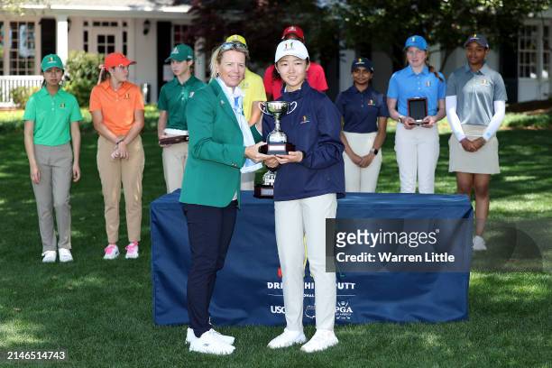 Abigail Lin, thir place overall in the Girl's 14-15 group, poses with Annika Sorenstam of Sweden during the Drive, Chip and Putt Championship at...