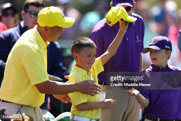 Parker Tang, first place overall in the Boy's 7-9 group, reacts during the Drive, Chip and Putt Championship at Augusta National Golf Club at Augusta...