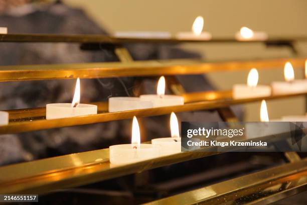 candles - memorial vigil stock pictures, royalty-free photos & images