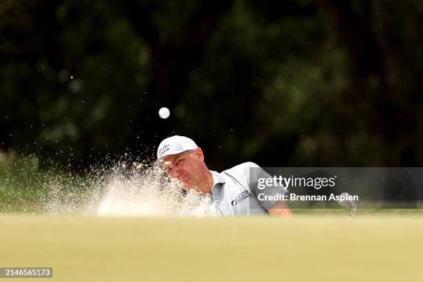 Brendon Todd of the United States plays his bunker shot on the 6th hole during the final round of the Valero Texas Open at TPC San Antonio on April...