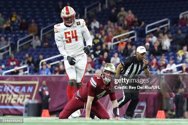 Perry of the Michigan Panthers reacts after being sacked by Taco Charlton of the Birmingham Stallions during the fourth quarter at Ford Field on...