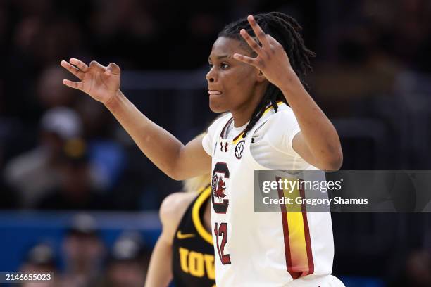 MiLaysia Fulwiley of the South Carolina Gamecocks reacts after a scoring a three point basket against the Iowa Hawkeyes in the first half during the...