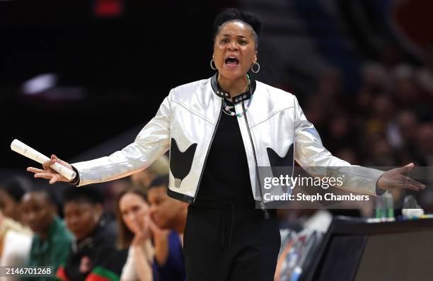 Head coach Dawn Staley of the South Carolina Gamecocks reacts in the first half during the 2024 NCAA Women's Basketball Tournament National...