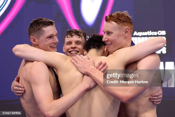 James Guy of Millfield embraces with Duncan Scott, Matthew Richards and Thomas Dean as they meet the nomination requirements for the 4x200m Olympic...