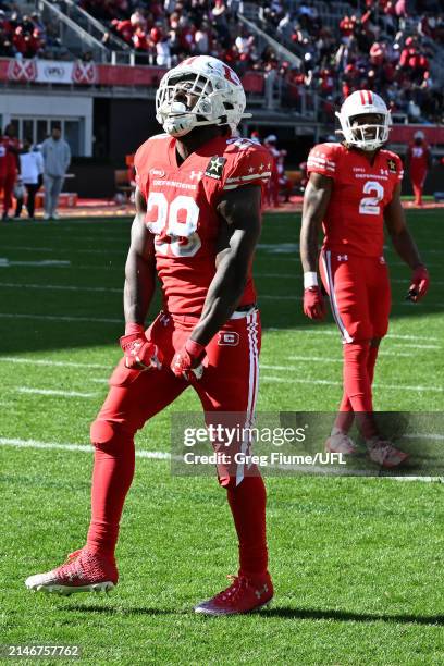 Darius Hagans of the DC Defenders celebrates after scoring a touchdown during the first quarter against the Houston Roughnecks at Audi Field on April...